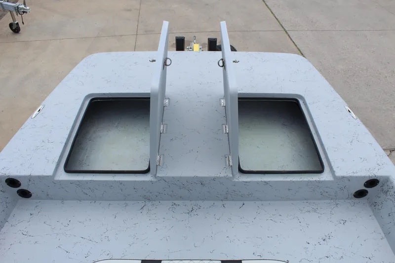 Slide: The Image of 2026 Freedom Boats EAGLE with modern seating and dual outboard motors. - 12