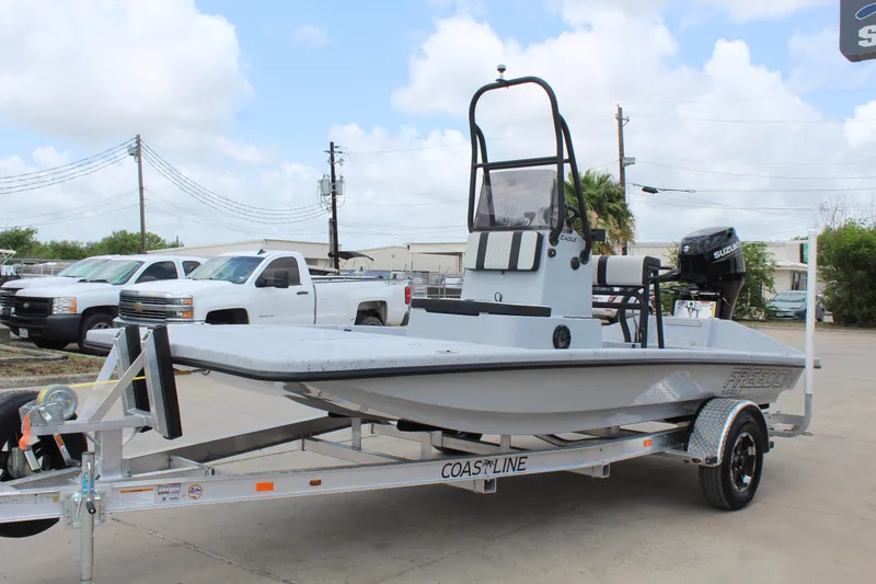 Slide: The Image of 2026 Freedom Boats EAGLE with 90 HP engine at dealership. - 3