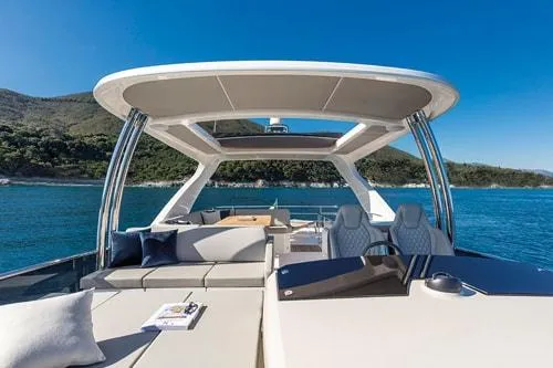 Slide: The Image of Luxurious 2023 Absolute Fly Co Ownership yacht with spacious deck and scenic ocean view. - 14