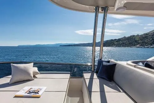Slide: The Image of Luxurious Absolute Fly Co Ownership yacht interior with ocean view, 2023 model. - 18