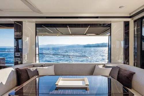 Slide: The Image of Luxurious yacht interior with ocean view, Absolute Fly Co Ownership 2023 model. - 24