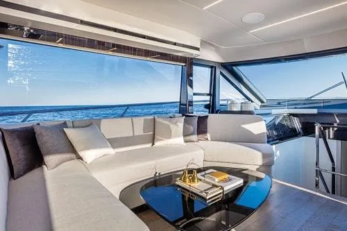 Slide: The Image of Luxurious yacht interior with modern design, featuring panoramic ocean views and elegant furnishings, 2023 Absolute Fly Co Ownership. - 25