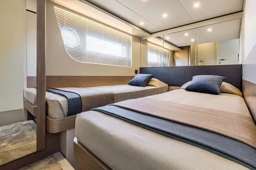 Slide: The Image of Luxurious twin bedroom in 2023 Absolute Fly Co Ownership yacht, featuring modern design and cozy ambiance. - 32