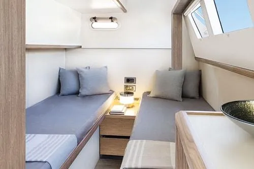Slide: The Image of Luxurious cabin interior of 2023 Absolute Fly Co Ownership yacht with twin beds and modern decor. - 39
