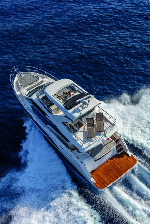 Slide: The Image of Luxury yacht cruising on open sea, Absolute Fly Co Ownership 2023 model. - 5