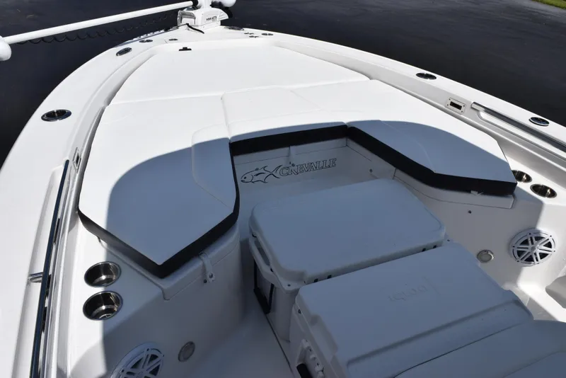 Slide: The Image of 2023 Crevalle 26 HCO boat deck with seating and storage compartments. - 14