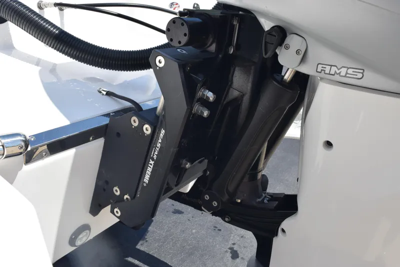 Slide: The Image of 2023 Crevalle 26 HCO boat engine mount detail with Smart Tabs system. - 7
