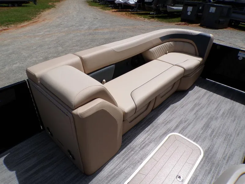 Slide: The Image of Luxurious seating on 2025 Godfrey Sweetwater 2286 SB pontoon boat, featuring beige upholstery. - 9