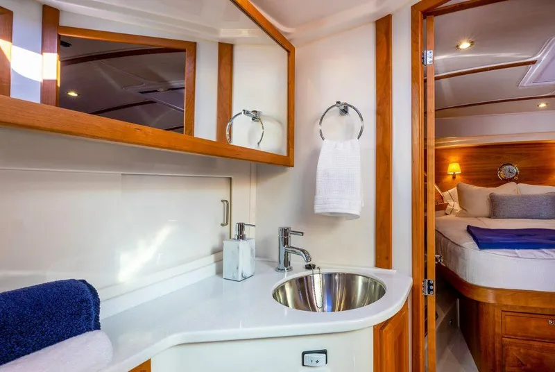 Slide: The Image of Luxurious bathroom and bedroom interior of 2026 Back Cove 372 yacht. - 12