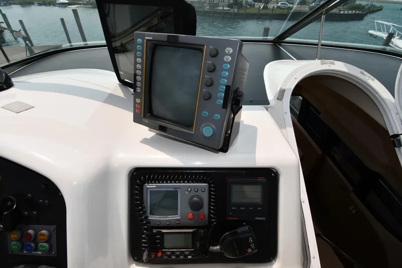 Slide: The Image of Control panel of 1998 Carver 530 Voyager Pilothouse with navigation equipment. - 22