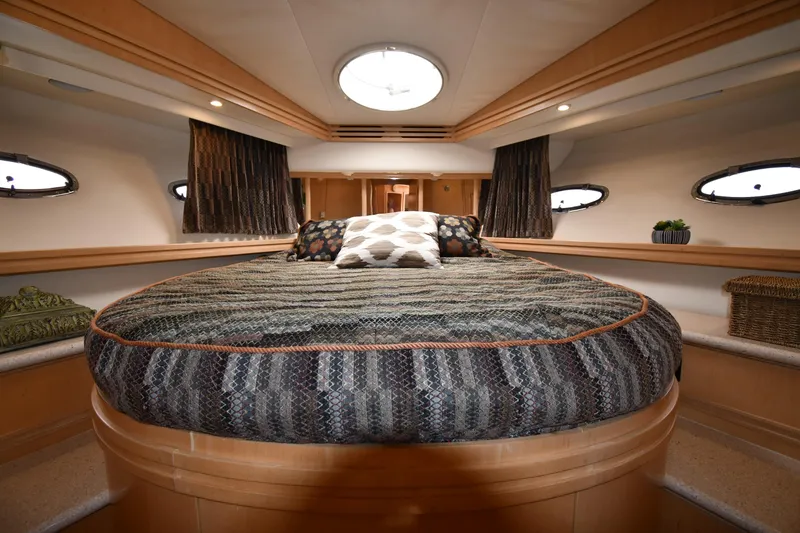 Slide: The Image of Luxurious bedroom interior of 1998 Carver 530 Voyager Pilothouse yacht with circular bed. - 39