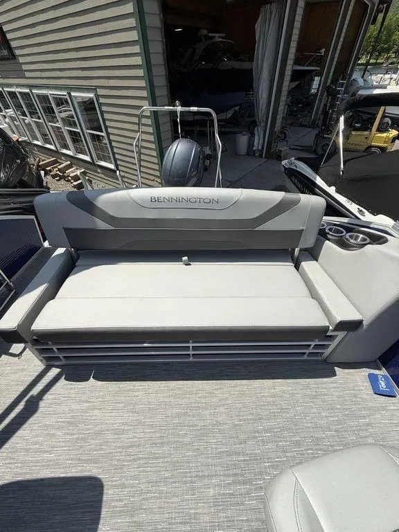 Slide: The Image of 2023 Bennington 22 SXSB boat with gray seating and modern design. - 20