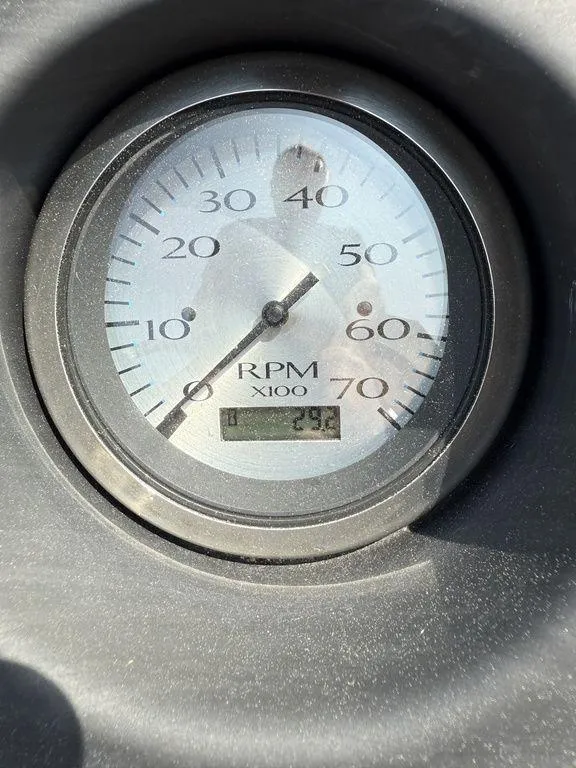Slide: The Image of Close-up of a 2023 Bennington 22 SXSB RPM gauge displaying 292. - 4