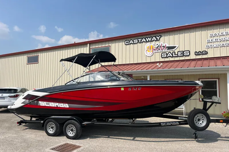 The Image of Red 2021 Scarab 255 ID boat on trailer at Castaway Yacht Sales. - 0