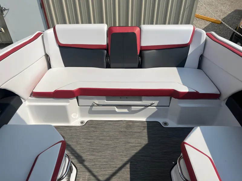 Slide: The Image of Interior of 2021 Scarab 255 ID boat with red and white seating. - 8