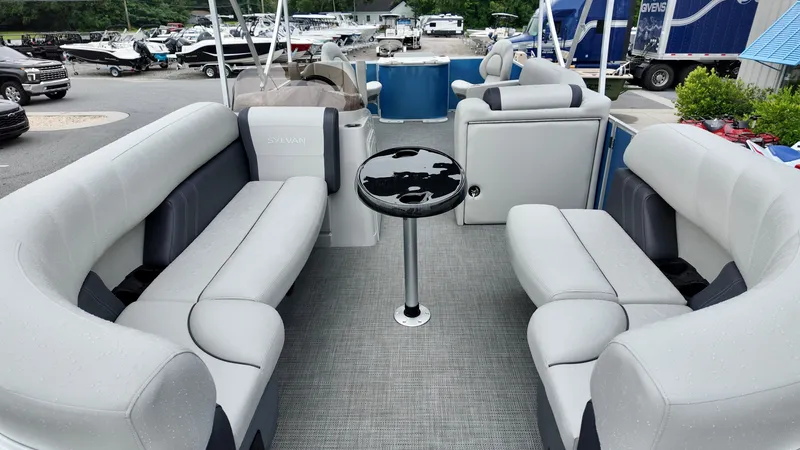 Slide: The Image of 2026 Sylvan Mirage 822 PARTY FISH pontoon boat with spacious seating and sleek design. - 12