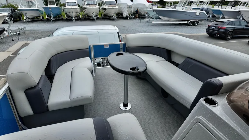 Slide: The Image of Luxurious seating on 2026 Sylvan Mirage 822 PARTY FISH pontoon boat, docked with other boats. - 5