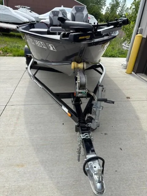 Slide: The Image of 2018 Polar Kraft Outlander 156 SC boat on trailer, parked outdoors. - 3