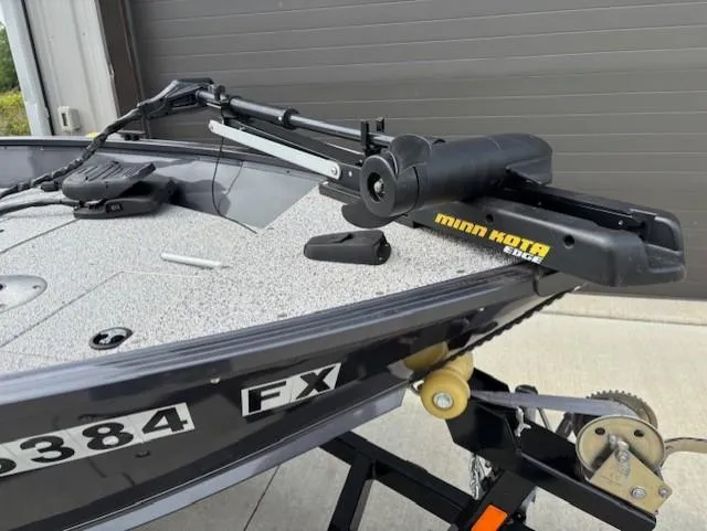 Slide: The Image of 2018 Polar Kraft Outlander 156 SC boat with Minn Kota Edge trolling motor on trailer. - 5