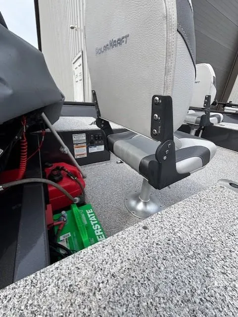 Slide: The Image of 2018 Polar Kraft Outlander 156 SC boat interior with seating and battery compartment. - 9