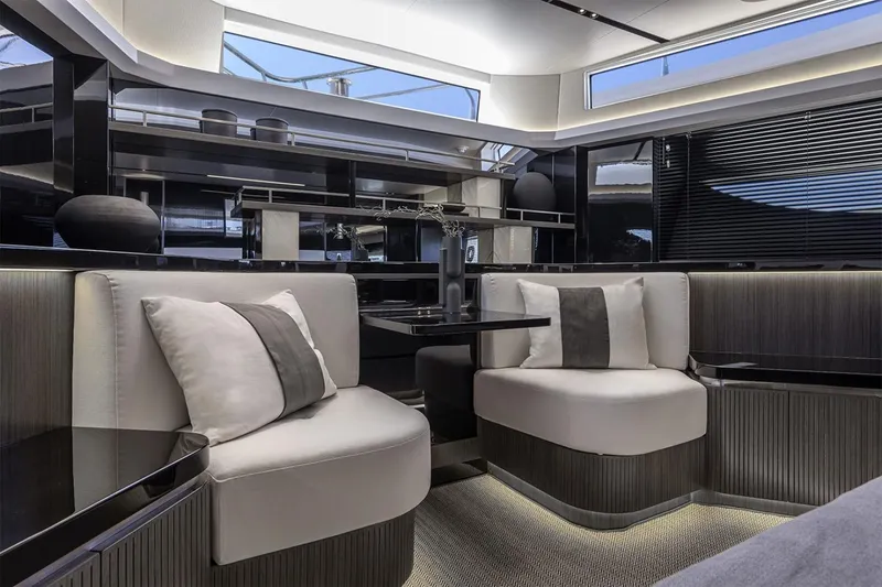 Slide: The Image of Luxurious interior of 2023 Pearl 72 Motor Yacht with modern seating and elegant design. - 12
