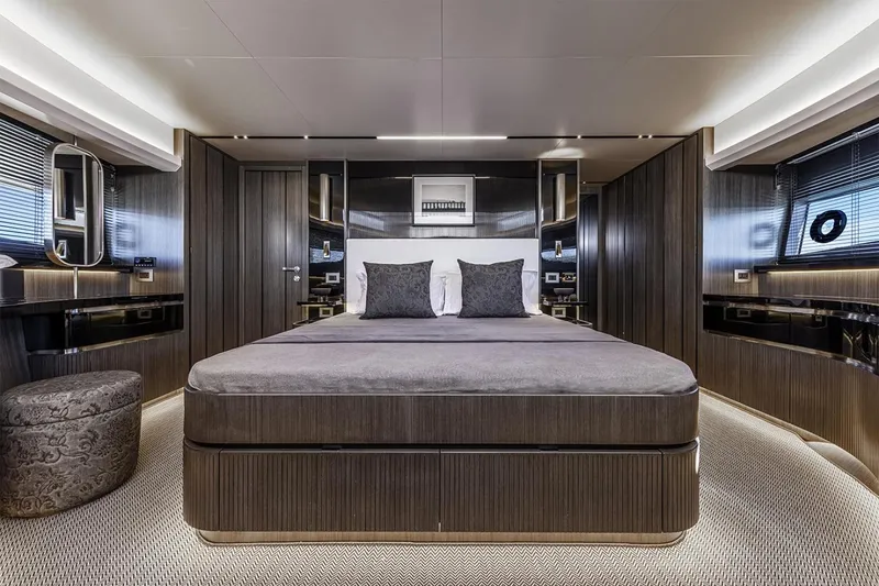 Slide: The Image of Luxurious bedroom interior of 2023 Pearl 72 Motor Yacht with modern design and elegant furnishings. - 13