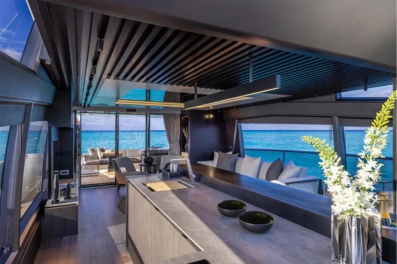 Slide: The Image of Luxurious interior of 2023 Pearl 72 Motor Yacht with ocean view and modern design. - 22
