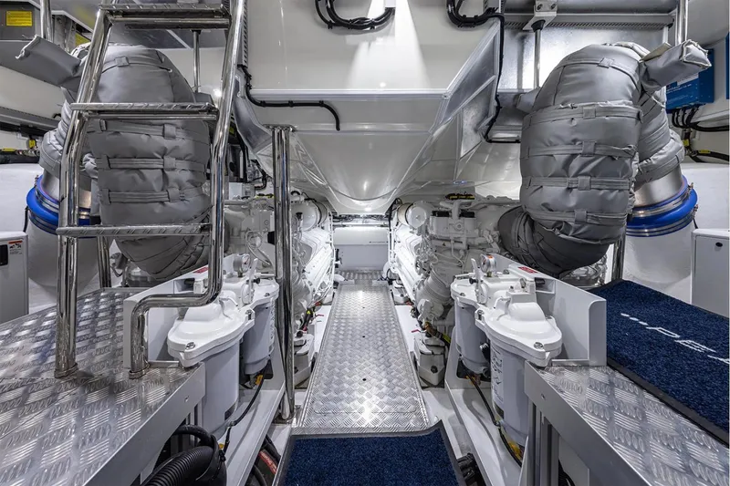 Slide: The Image of Engine room of 2023 Pearl 72 Motor Yacht, featuring advanced machinery and sleek design. - 34