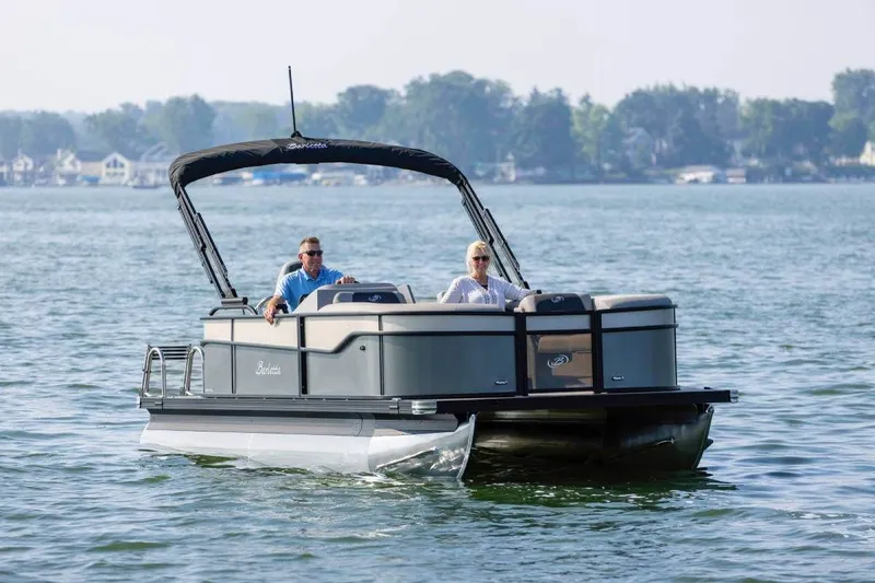 The Image of 2026 Barletta Aria 20 L pontoon boat on a lake. - 0