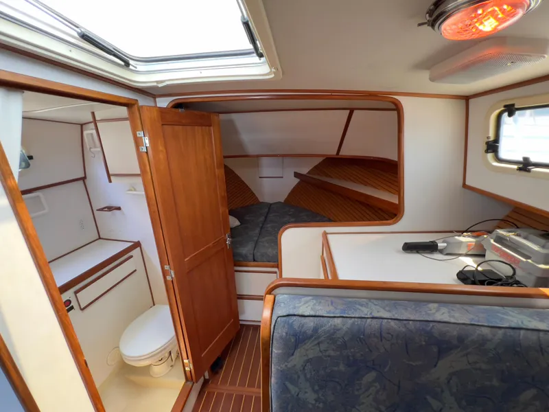Slide: The Image of Interior of 2001 Norstar 301 boat with cozy cabin and bathroom. - 38