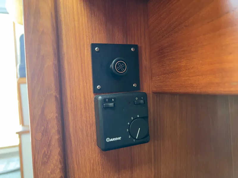 Slide: The Image of Control panel on wooden interior of 2001 Norstar 301 boat. - 48