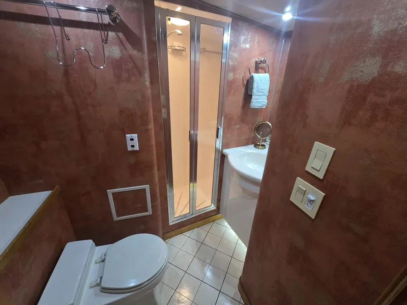 Slide: The Image of Bathroom interior of 1994 Hatteras 82 Convertible yacht with shower and sink. - 20