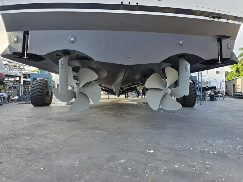 Slide: The Image of Underside view of 1994 Hatteras 82 Convertible yacht with dual propellers. - 43