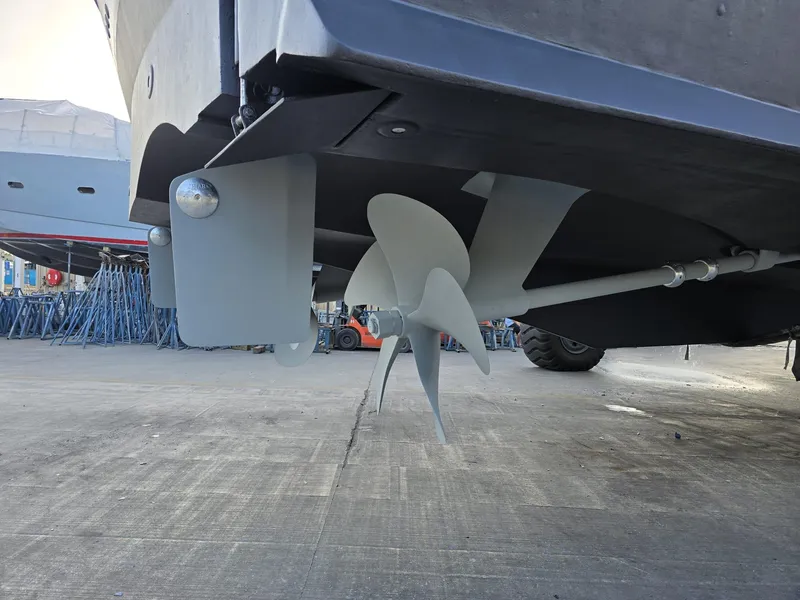 Slide: The Image of Propeller of 1994 Hatteras 82 Convertible yacht on dry dock. - 45
