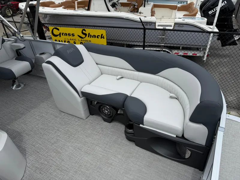 Slide: The Image of 2025 Avalon LSZ Versatile Rear Lounger with gray and white seating on a boat deck. - 10