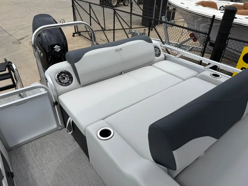 Slide: The Image of 2025 Avalon LSZ Versatile Rear Lounger boat with sleek seating and modern design. - 17