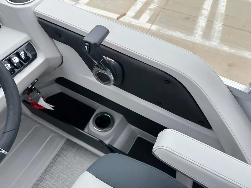 Slide: The Image of 2025 Avalon LSZ Versatile Rear Lounger interior with sleek controls and cup holder. - 31