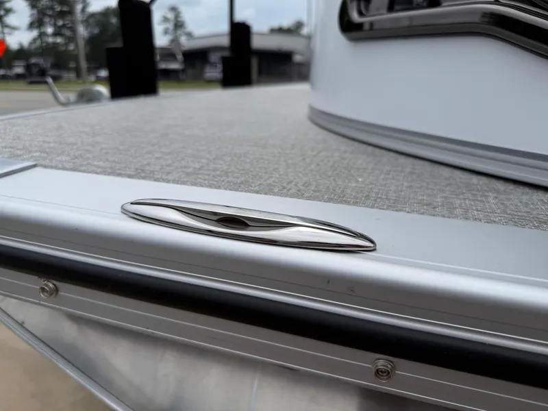 Slide: The Image of 2025 Avalon LSZ Versatile Rear Lounger boat deck with sleek cleat design. - 38