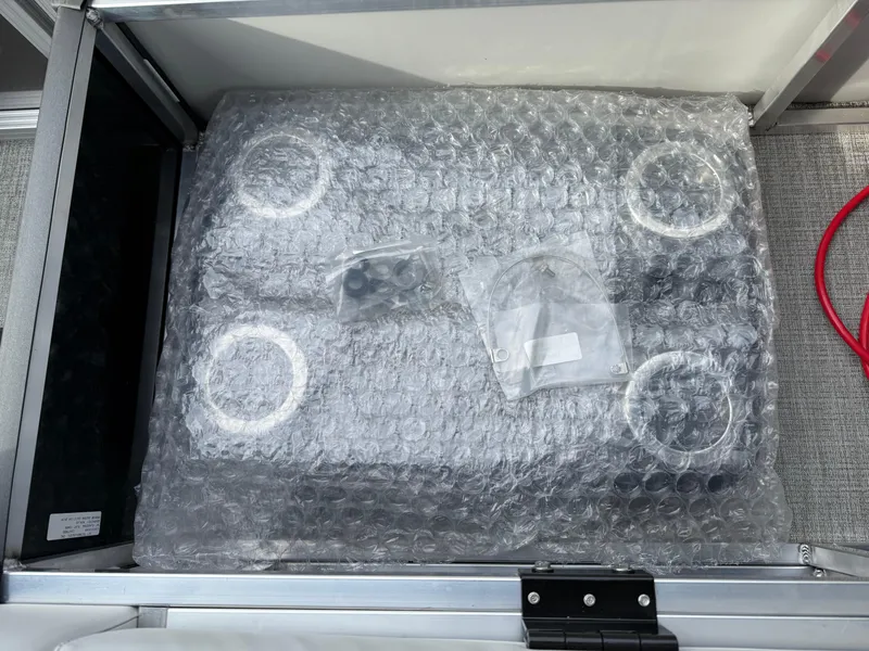 Slide: The Image of Bubble-wrapped package in Avalon LSZ Versatile Rear Lounger 2025, featuring circular components. - 42