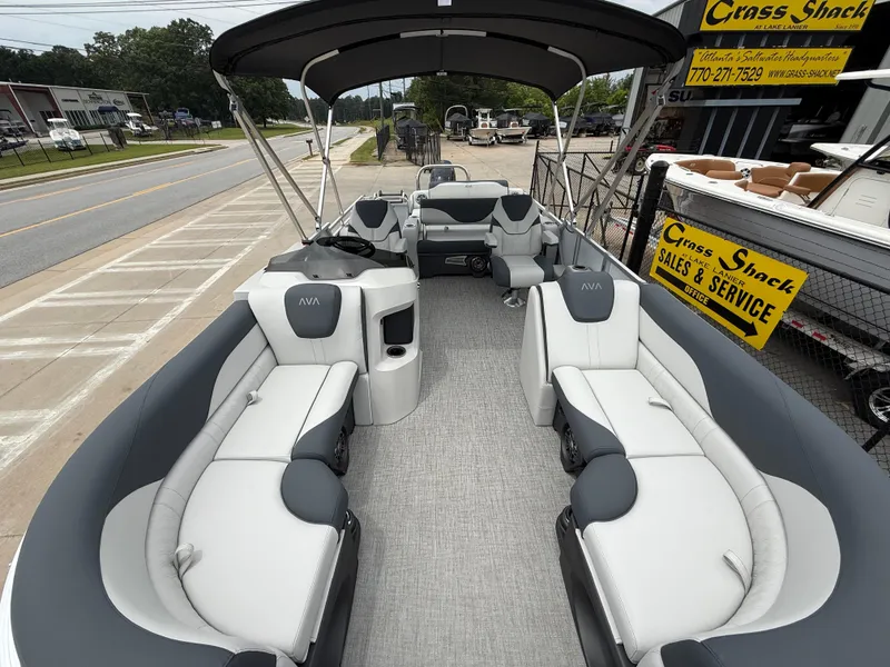 Slide: The Image of 2025 Avalon LSZ Versatile Rear Lounger pontoon boat with spacious seating and modern design. - 8
