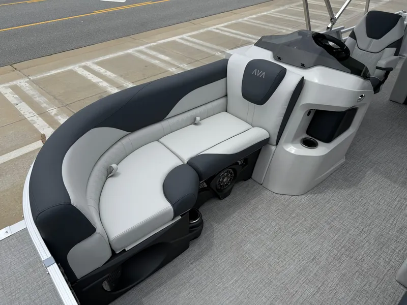 Slide: The Image of 2025 Avalon LSZ Versatile Rear Lounger boat interior with gray seating and modern design. - 9