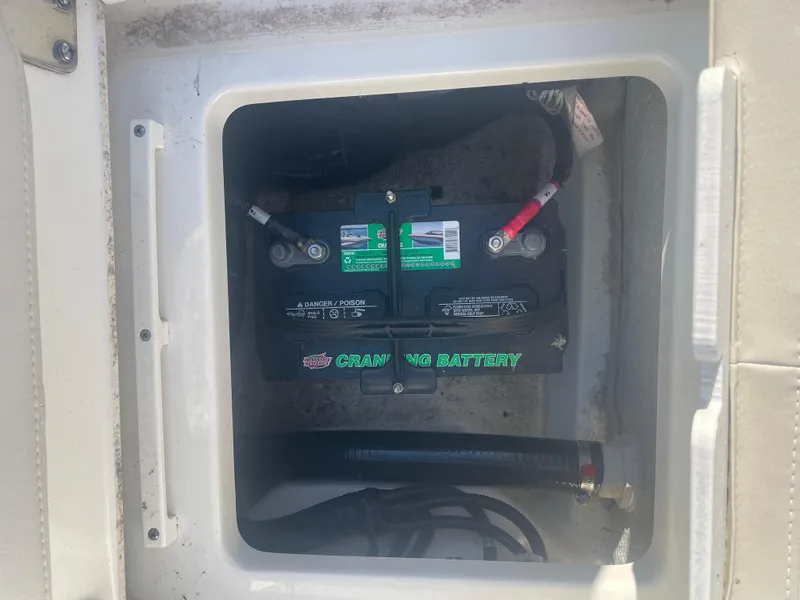 Slide: The Image of Battery compartment of a 2021 Boston Whaler 210 Montauk boat. - 9