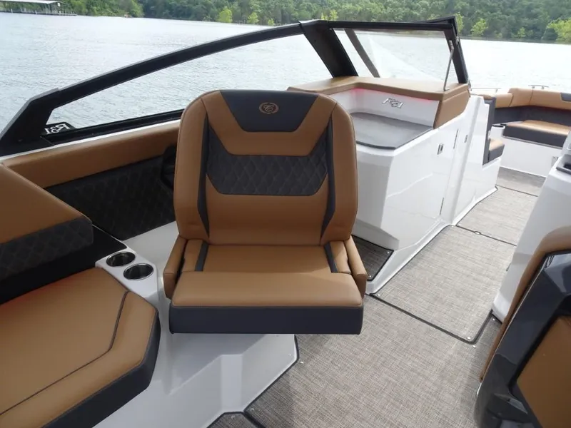 Slide: The Image of Luxurious interior of 2025 Cobalt R31 boat with brown leather seating and modern design. - 15