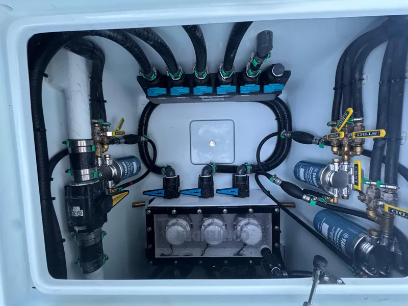 Slide: The Image of Electrical and plumbing system inside 2025 Contender 39ST boat. - 4