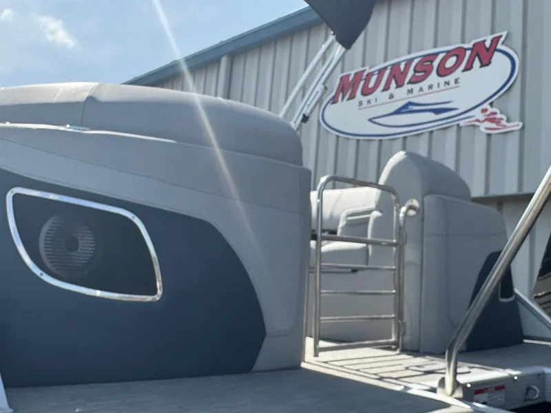Slide: The Image of Luxurious seating area on 2023 Bennington 24 LXFB pontoon boat with cup holders. - 16