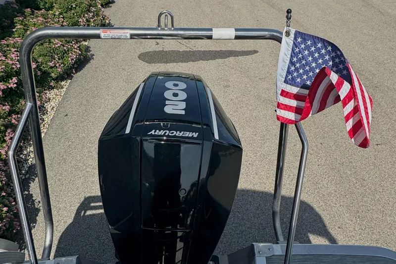 Slide: The Image of 2023 Bennington 24 LXFB pontoon boat interior with luxurious seating and cup holders. - 18