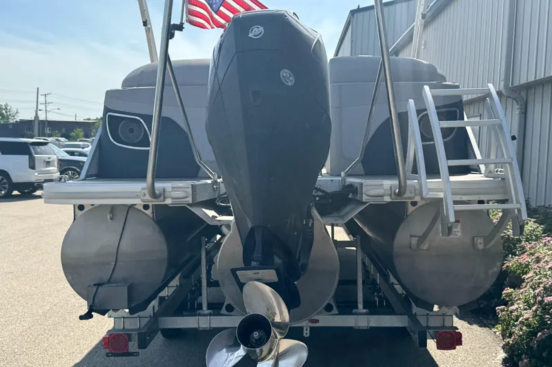 Slide: The Image of 2023 Bennington 24 LXFB pontoon boat with luxurious seating and modern design. - 19