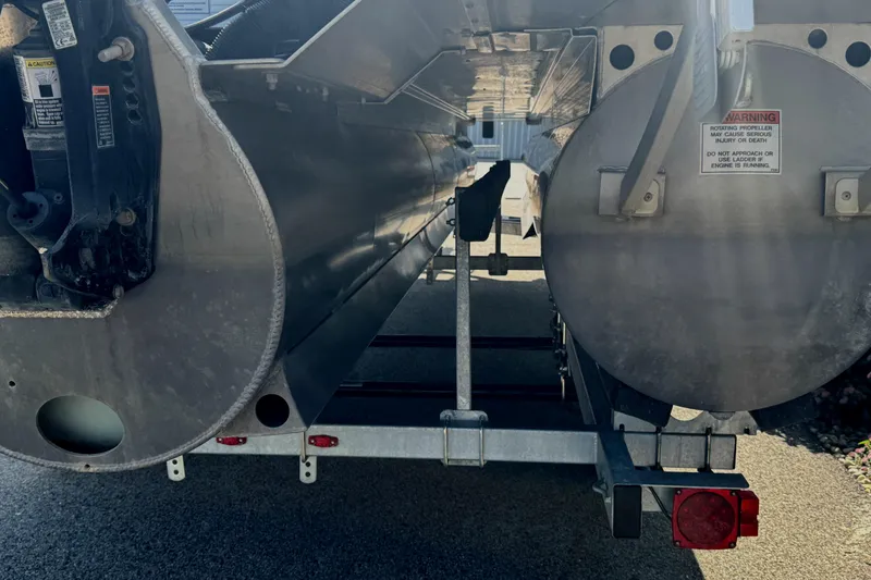 Slide: The Image of 2023 Bennington 24 LXFB pontoon boat interior with plush seating and modern design. - 20