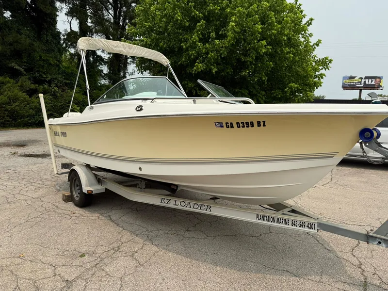 Slide: The Image of 2007 Sea Pro 186 Dual Console boat on trailer, parked outdoors. - 3