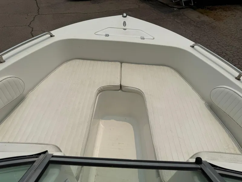 Slide: The Image of 2007 Sea Pro 186 Dual Console boat with spacious bow seating area. - 5
